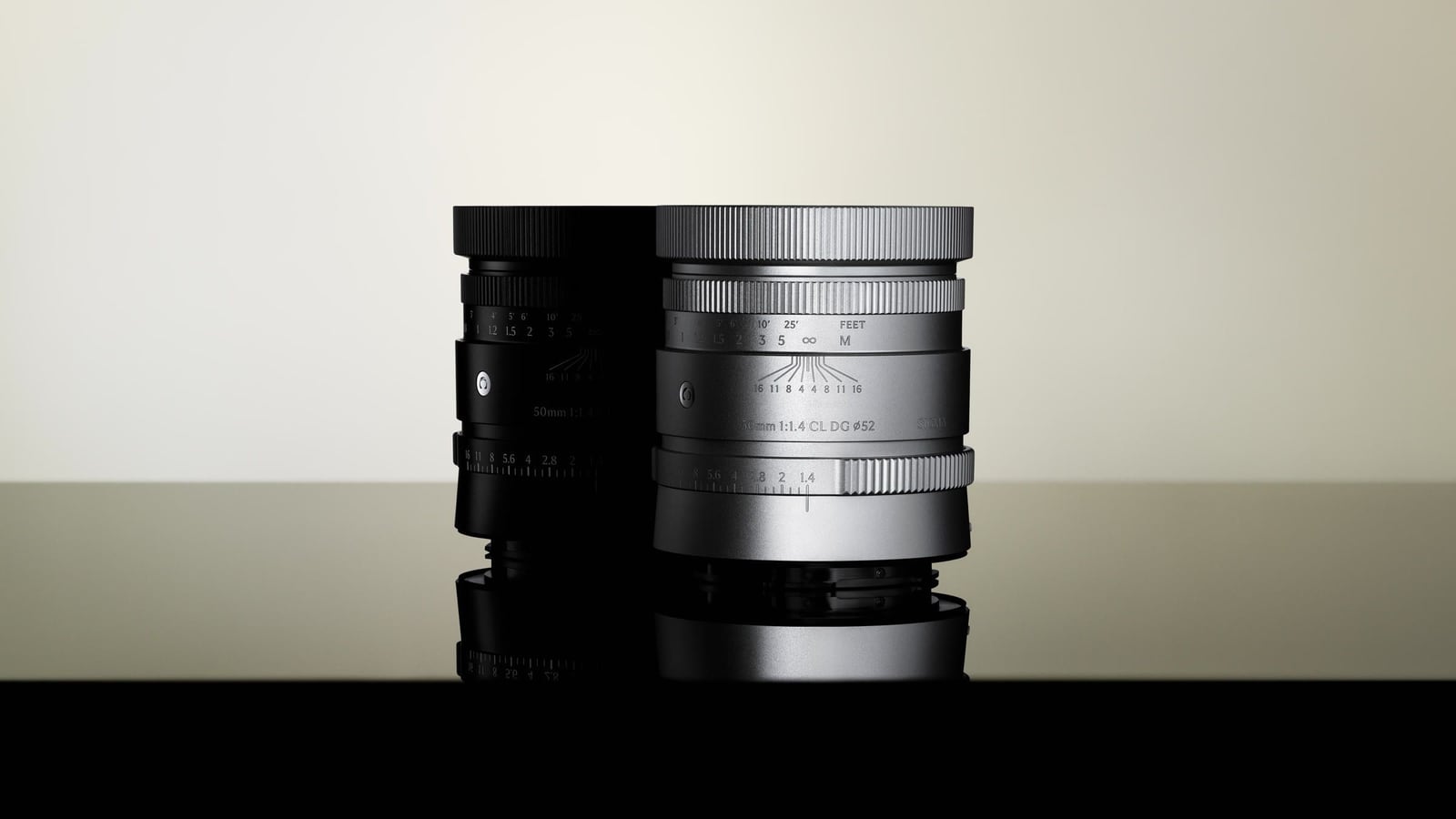 Sigma 50mm F1.4 CL DG | Contemporary in black and silver against a light backdrop
